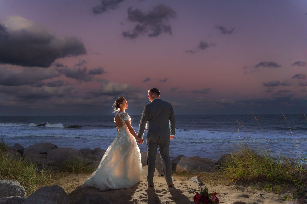 Fort Fisher Wedding Photographers - Ft Fisher Wedding Photography  - Bride & groom on the beach  - beach wedding photo -   Fort Fisher North Carolina -  Wedding Photography - Wedding Ideas - Bride - Groom - Wedding Dress - Chris Lang Photography- Popular wedding location -  