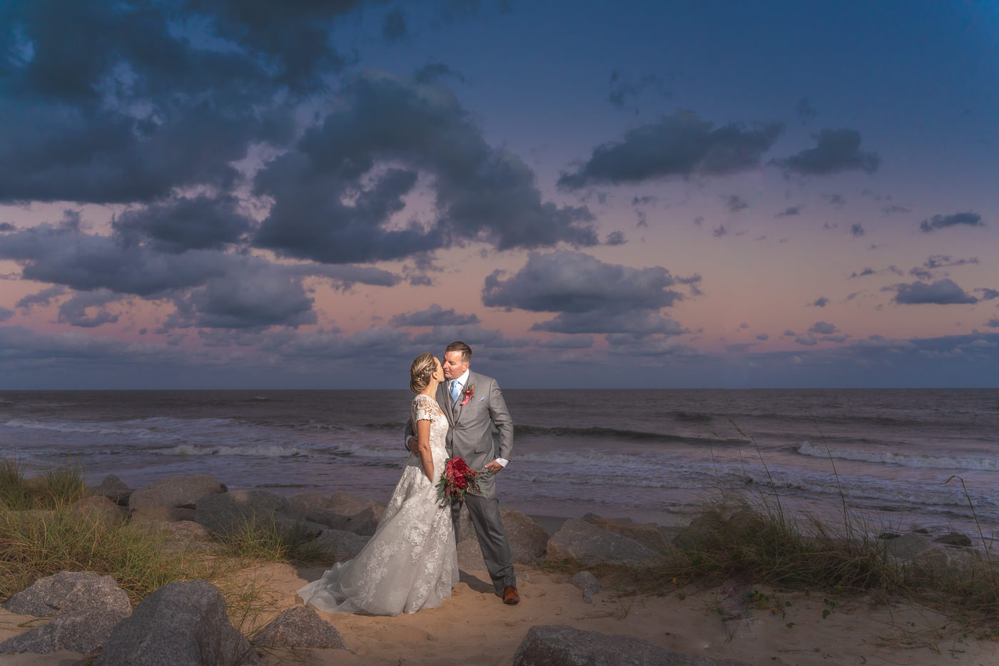 Fort Fisher Wedding Photographers - Ft Fisher Wedding Photography   -  Sunset wedding photo - bride  - groom - fort fisher beach - beach wedding  - Chris Lang Photography