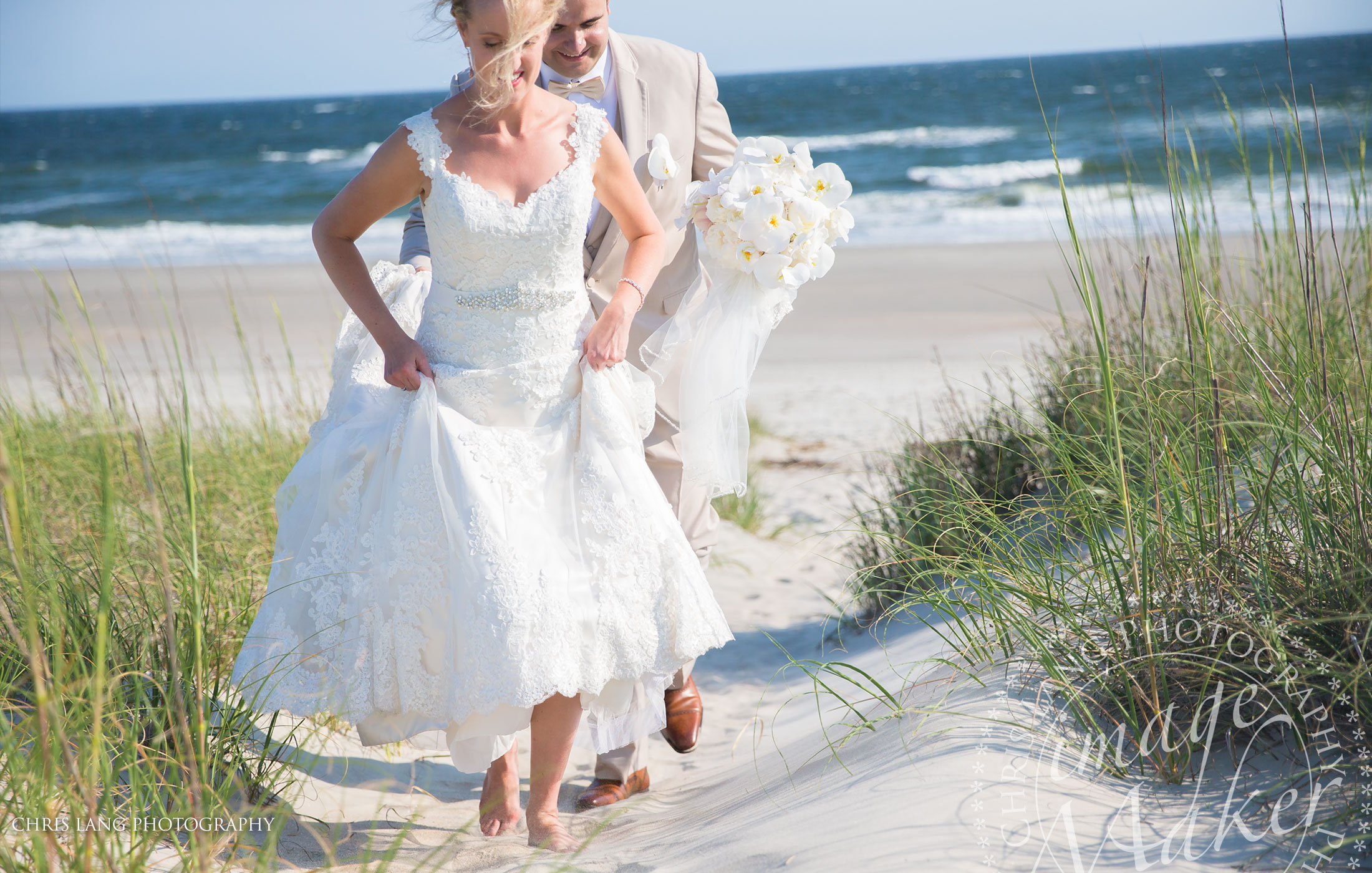 Bride & groom walking up a Bald Head Island Beach - Bald Head Wedding Photography 