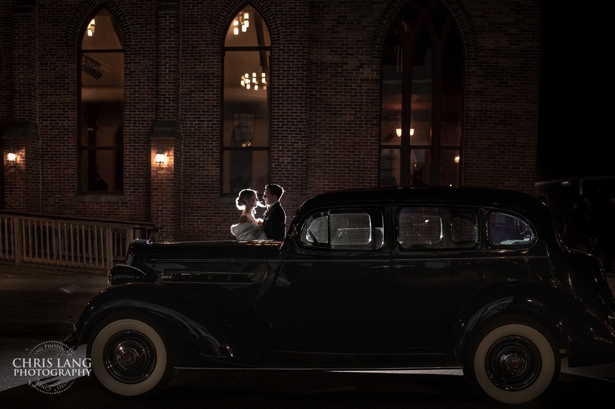 Bride and groom with old car in front of the Brooklyn Arts Center - wedding photo - 