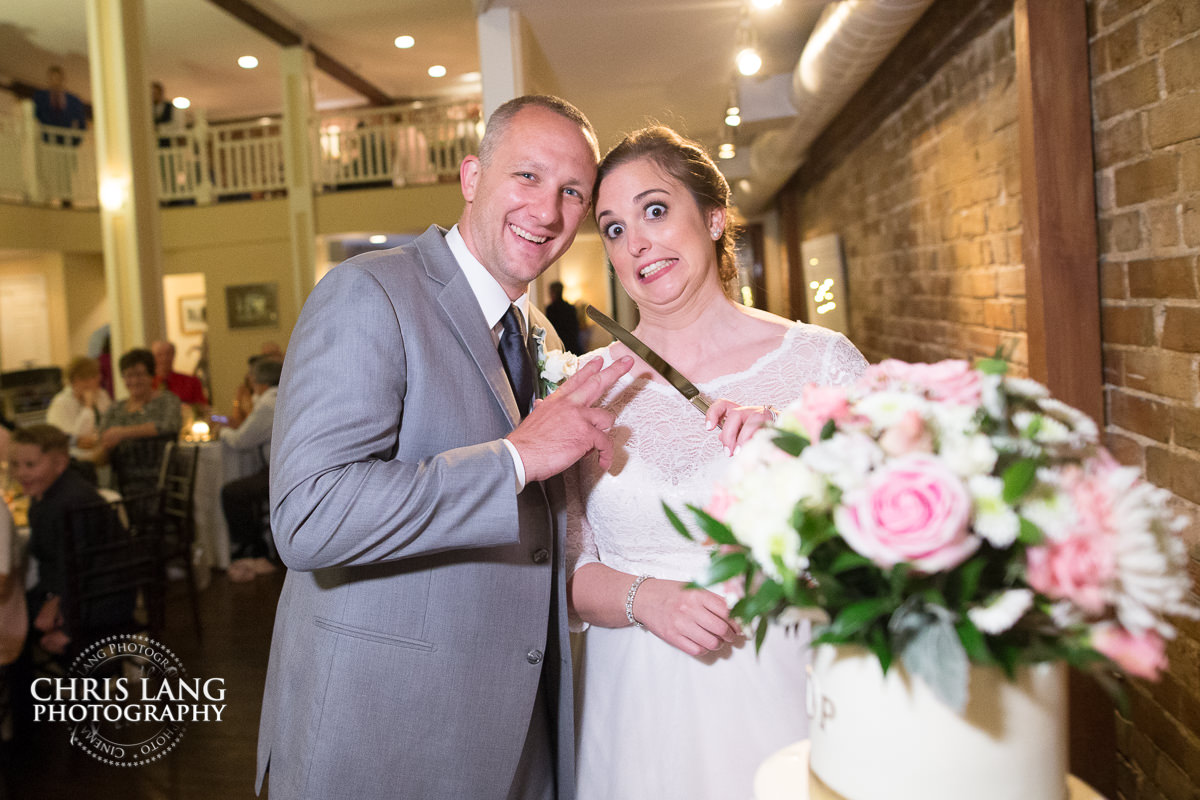 128 South Wedding & Reception Venue - Downtown Wilmington NC - Wedding Photography by Chris Lang Photography - Wedding image - wedding ideas - bride & groom cutting cake