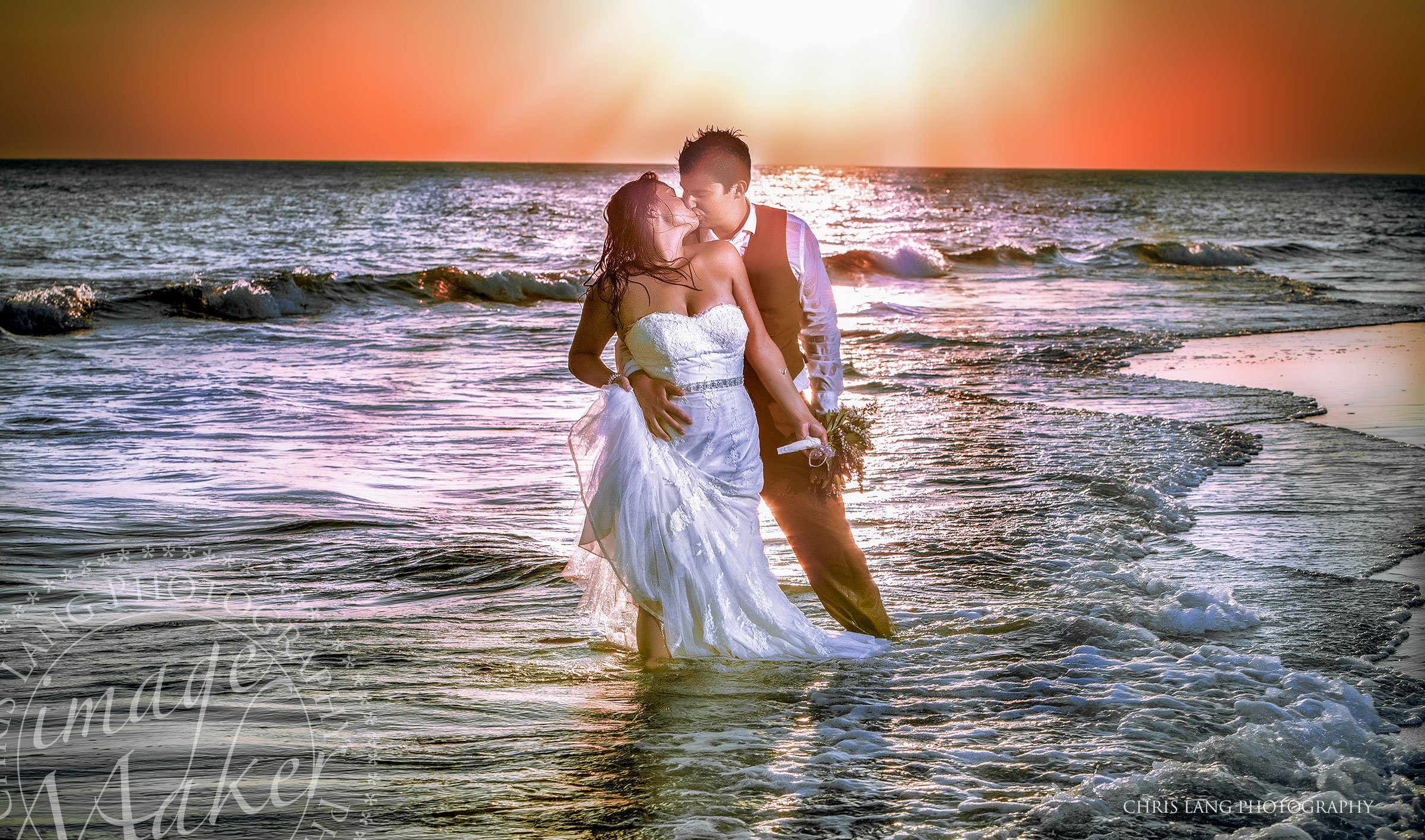 Bride & Groom in the Atlantic Ocean at the Shaols Club on Bald Head Island - North Carolina Wedding Photographers