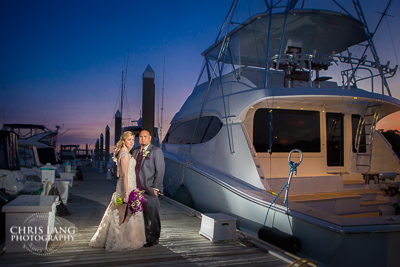Image of wedding couple at the Bluewater Grill in Wrightsvilee Beach  NC.  Bluewtergrill wedding & reception venue