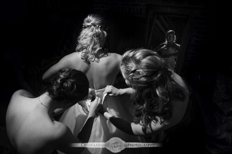 Fine Art-Wedding-Photography-Pictures-Ideas-Inspiration-Real Weddings-Wilmington-NC-Photographers-Bride putting on wedding dress