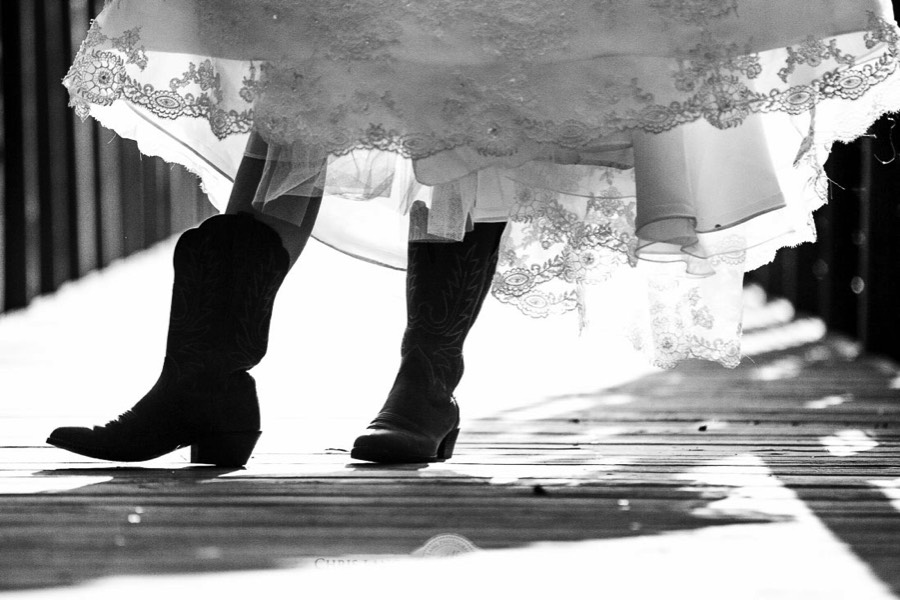 Fine-Art-Bridal-Photography-in-Black-and-White-Pictures-Ideas-and-Inspiration-Wilmington NC Wedding Photographers-Bride in wedding dress and cowboy boots