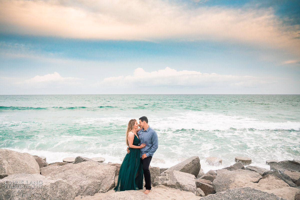Fort Fisher Wedding Photographers  - Forst Fisher Wedding Photographers- Beach photo with couple - Fort Fisher North Carolina -  Engagement Photography - Popular engagement photography locations - Lifestyle engagement photography -  Ft Fisher engagement photographers - Engagement session ideas - Trends in engagement photography - Chris Lang Photography - Engagement photos 