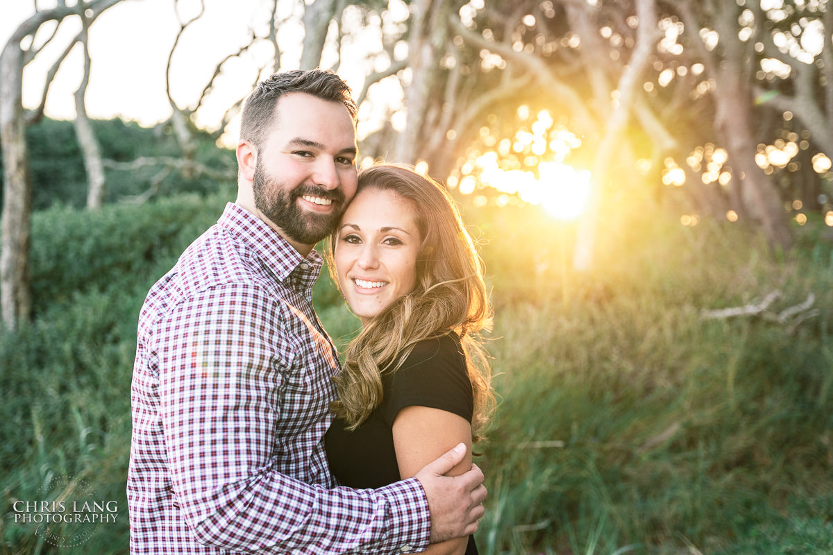 Fort Fisher Wedding Photographers Sunset Couple image - Fort Fisher North Carolina -  Engagement Photography - Popular engagement photography locations - Lifestyle engagement photography -  Ft Fisher engagement photographers - Engagement session ideas - Trends in engagement photography - Chris Lang Photography - Engagement photos 