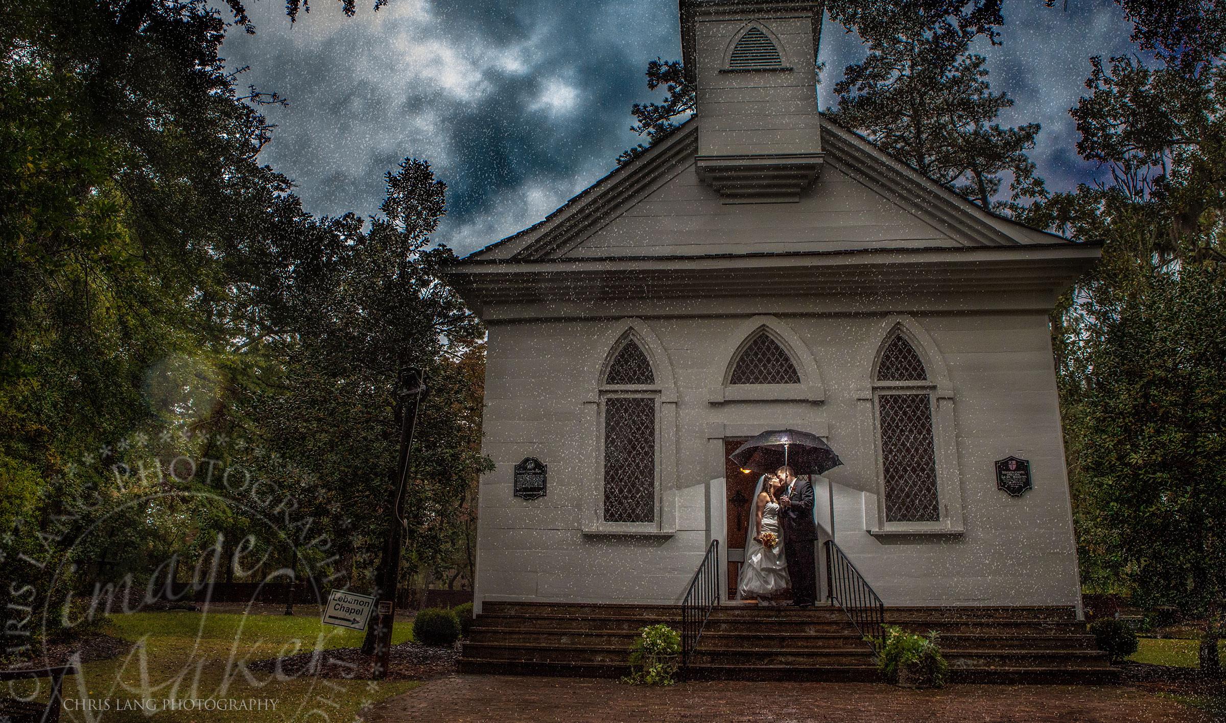 Image of the Lebanon Chapel in Airlie Gardens during a wedding.   Wilmington NC Wedding Photographer