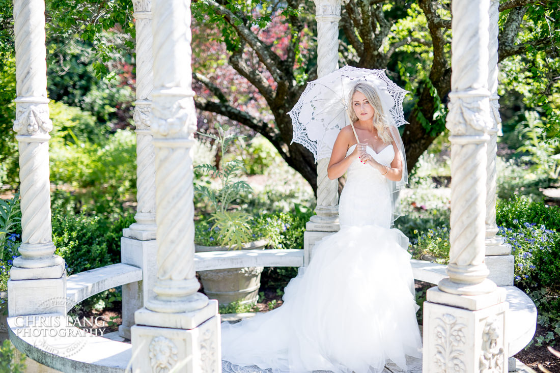 bride with perasol - arboretum - bridal portrait photography - photographers - bridal portraits - bride - wedding dress - ideas - wilmington nc