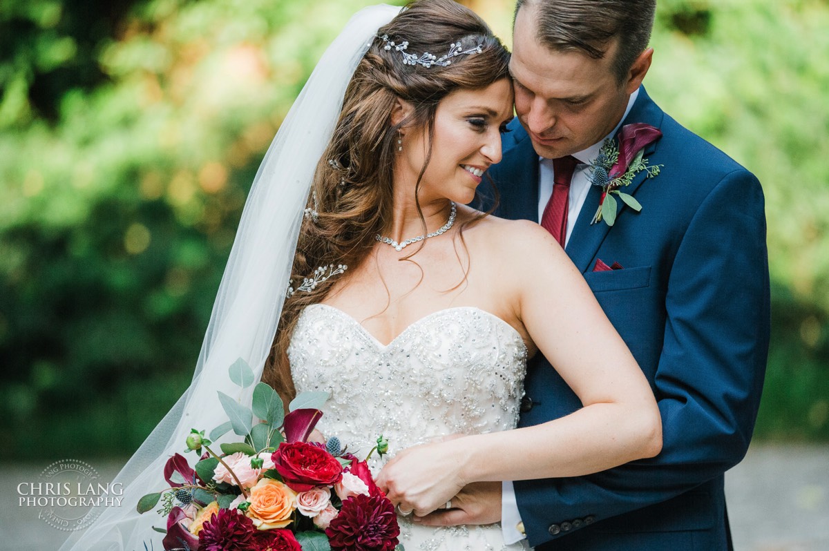 Romantic picture of bride and groom  -  wedding jewelry - wedding flowers - happy couple - wedding day - brooklyn arts center - weddings - wedding venue -  wedding photo - ideas - wilmington nc - chris lang photography 