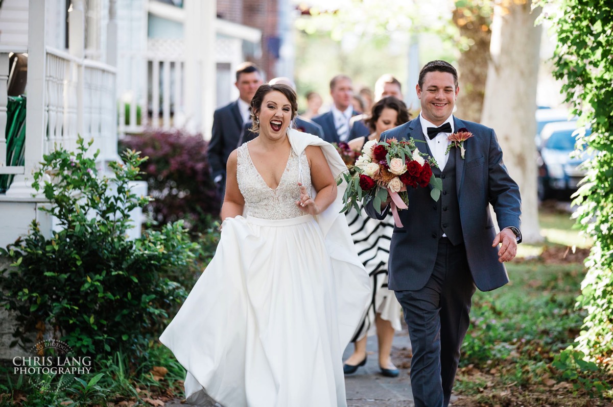 Bride and groom walking with bridal party - having fun - wedding day - brooklyn arts center - weddings - wedding venue -  wedding photo - ideas - wilmington nc - chris lang photography 