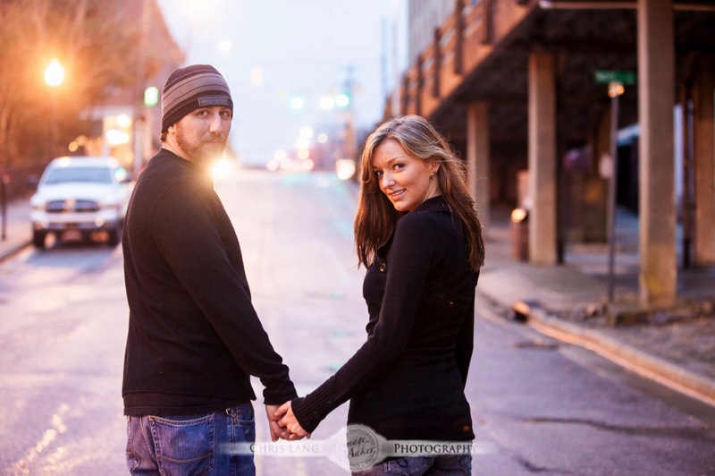 Wilmington-NC-Engagement-Photography-Lifestyle Engagment Session-Picture-Ideas-Inspiration-Couple walking in Downtown
