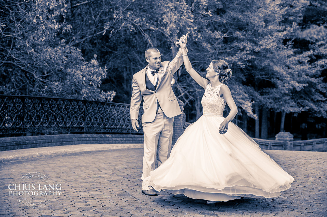 Bride and groom dancing on thebrick bridge at RIver Landing Country Club, Wallace NC