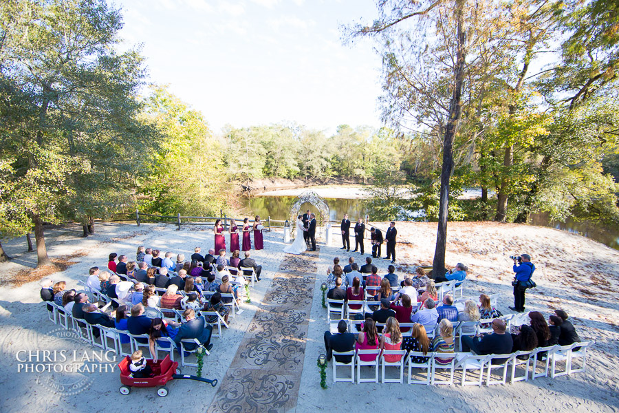 image of wedding ceremony at the RIver Lodge - RIver Landing Wallace NC