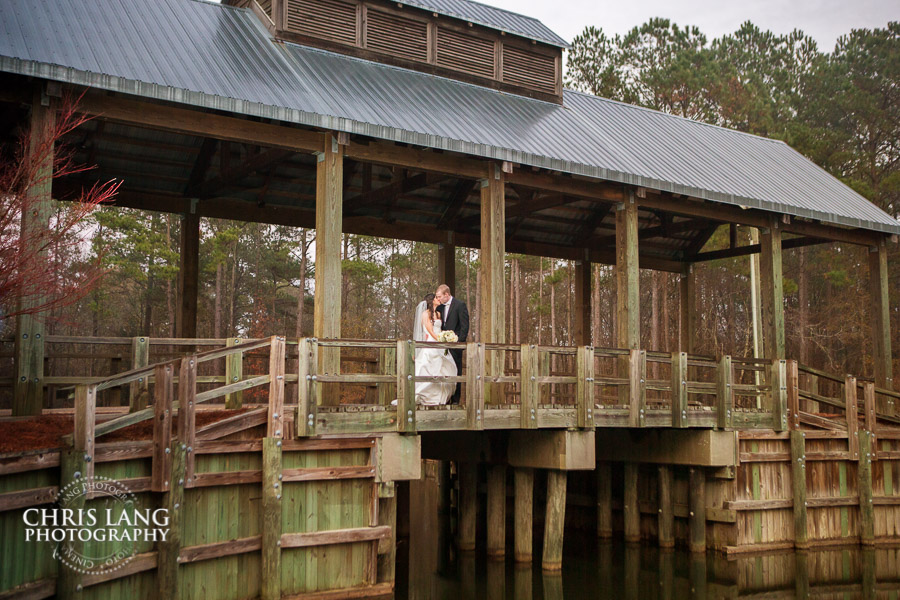 wedding image bride and groom at the covered bridge - River Landing - Wallace NC- River Landing Weddings