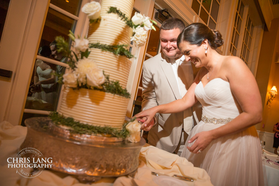 Cake cuttting in the River Landing Grandroom - Wedding Photography