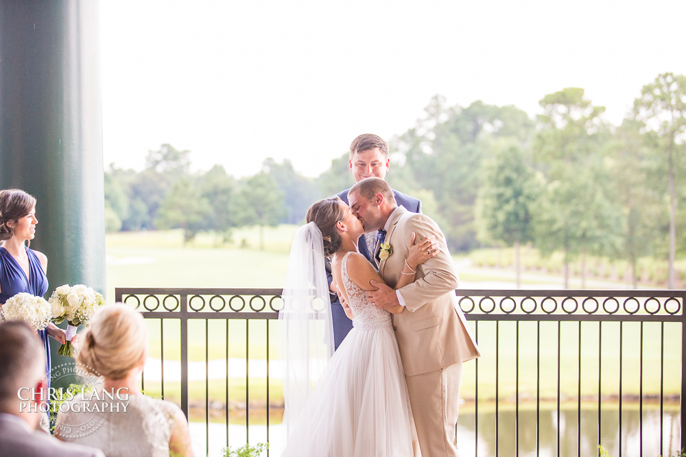 Wedding Ceremony on the Vernada at River Landing - The First Kiss - River landing Wedding Photographers