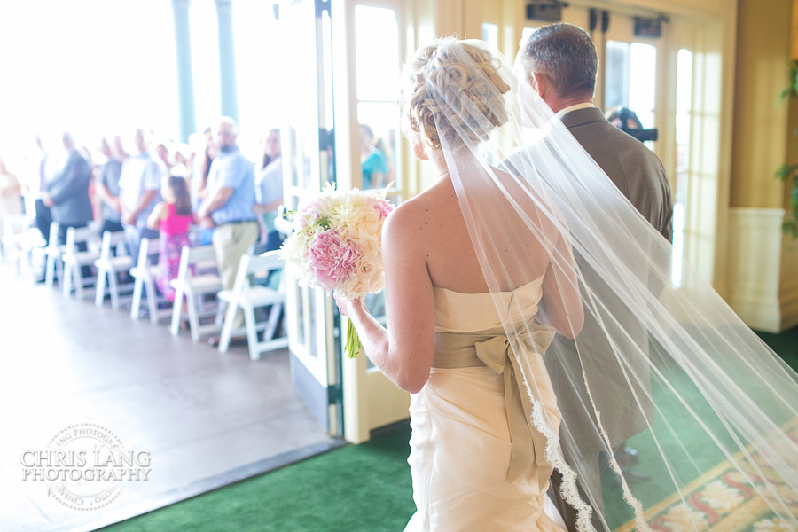 Bride walking down the isle - Weddings on the Vernada - River Landing Country Club - Wallace NC