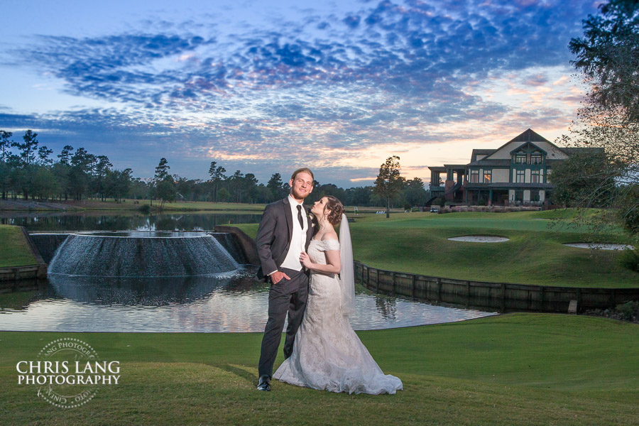 Iconic wedding picture at the waterfall - River Landing, Wallace NC - River Landing Weddings