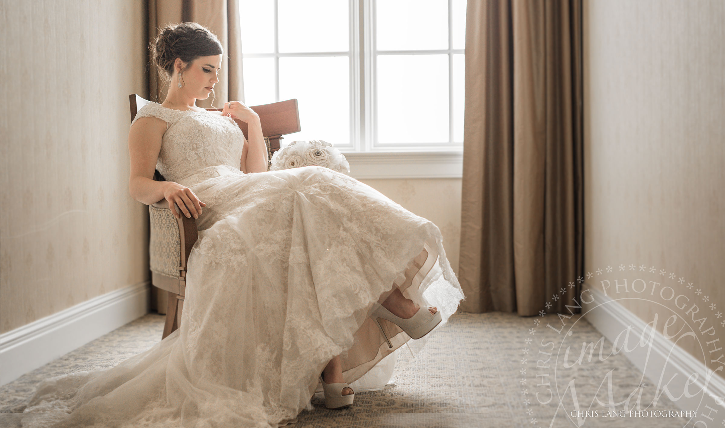 Bridal picture of of soon to be bride siting in a chair with her bridal boquet. Wilmington NC Photographer