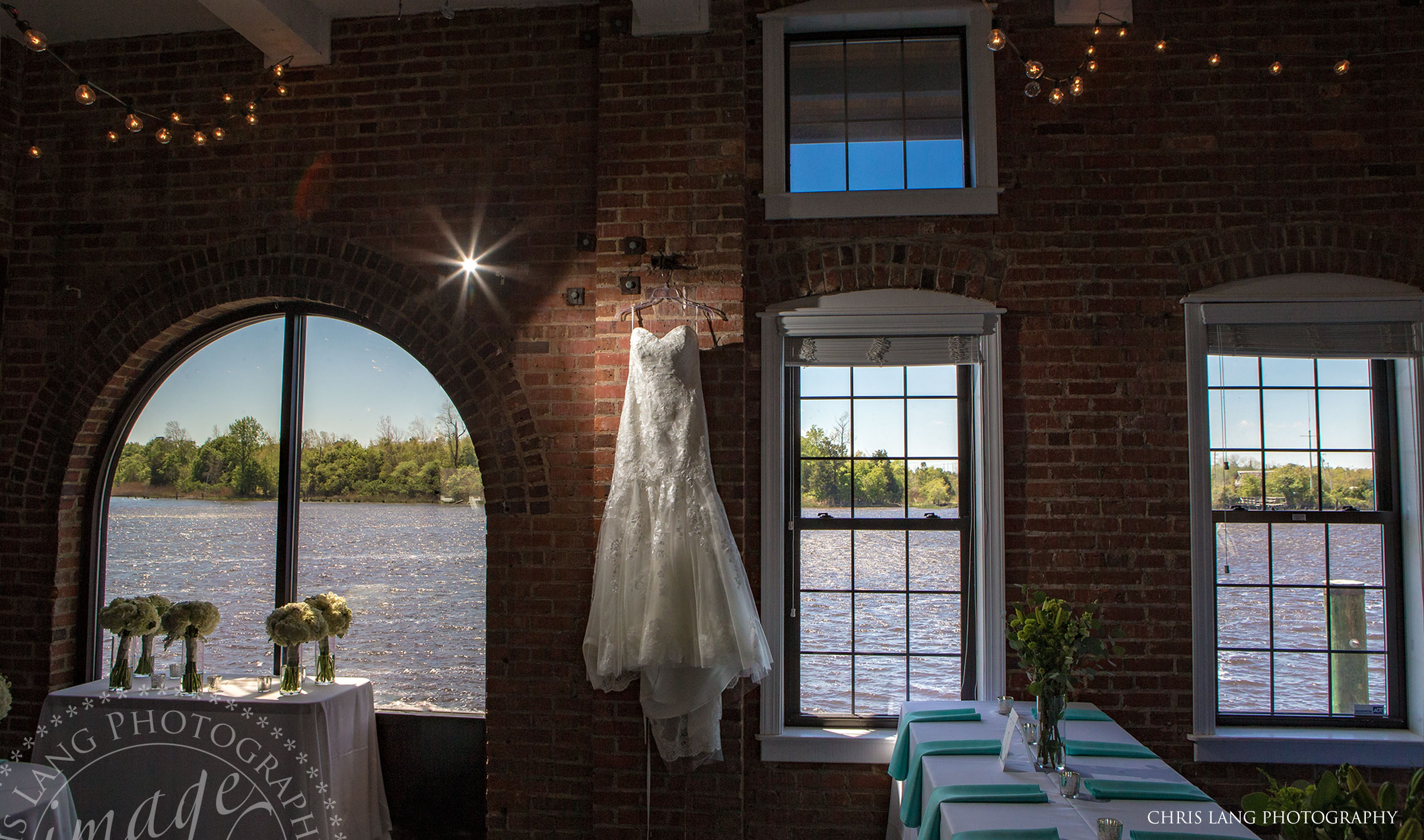 Downtown Wilmington NC Wedding Venues - The River Room locarted on the Cape Fear River Waterfront - View of the Cape Fear River  looking outside the windows  of the River Room