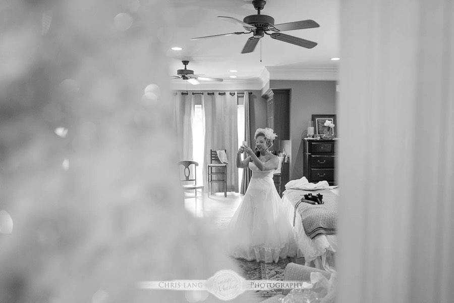 Real Weddings-Featured Wedding in Black and White-Wedding Ideas-Style-Trends-Wilmington NC Wedding Photographers-Bride taking selfie in her wedding dress
