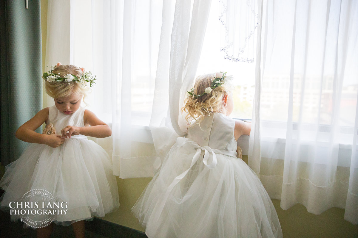 adoravle flower girls getting ready  - flower girl dress - pre wedding photos - wedding photo ideas - getting ready wedding pictures - bride - groom - wedding dress - wedding detail photos - wilmington nc wedding photography