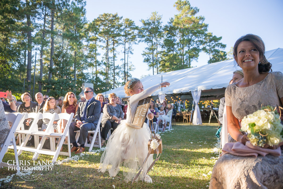 flower girl throwing flowers - wilmington weddings - wedding ceremony photo - wedding ceremonies - bride - groom - bridal party - wedding ceremony photography - ideas