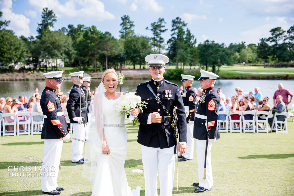 river landing weddings - bride and groom walking down isle - wedding ceremony photo - wedding ceremonies - bride - groom - bridal party - wedding ceremony photography - ideas