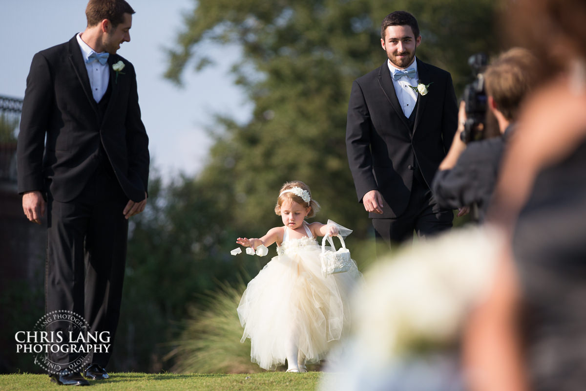 flower girl throwing flowers - wedding ceremony photo - wedding ceremonies - bride - groom - bridal party - wedding ceremony photography - ideas