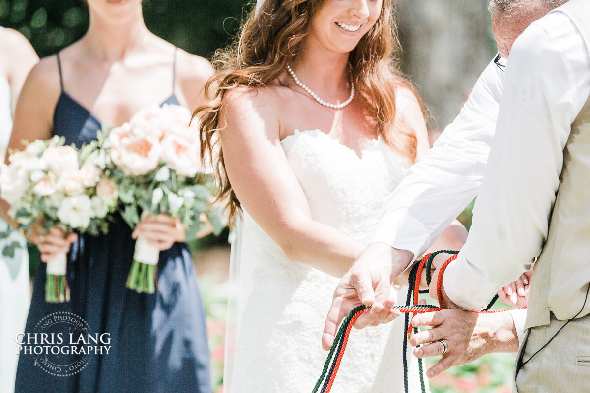 rope tieing ceremony - airleie gardensweddings - Wedding ceremony photo - Wedding ceremonies - bride - groom - bridal party - wedding ceremony photography - ideas - Wilmingotn NC Wedding Photography