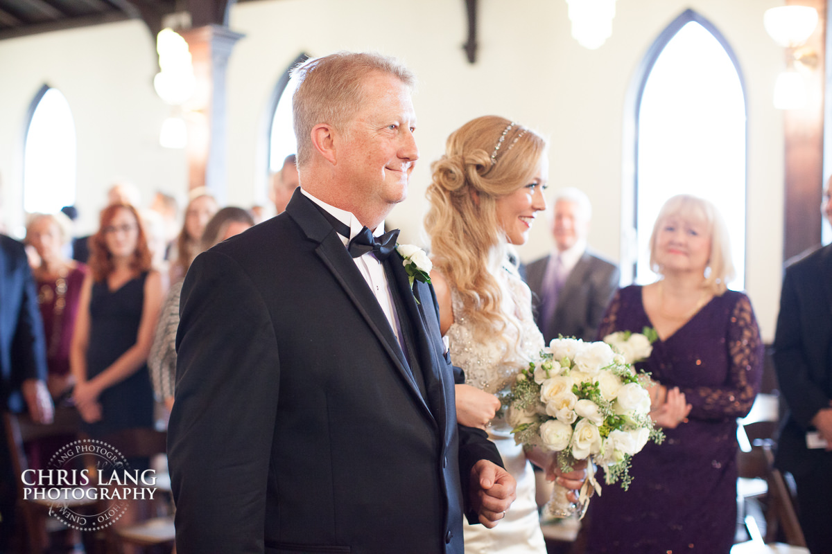 bride walkingdown the isle - Wedding ceremony photo - Wedding ceremonies - bride - groom - bridal party - wedding ceremony photography - ideas - wilmington nc wedding photography