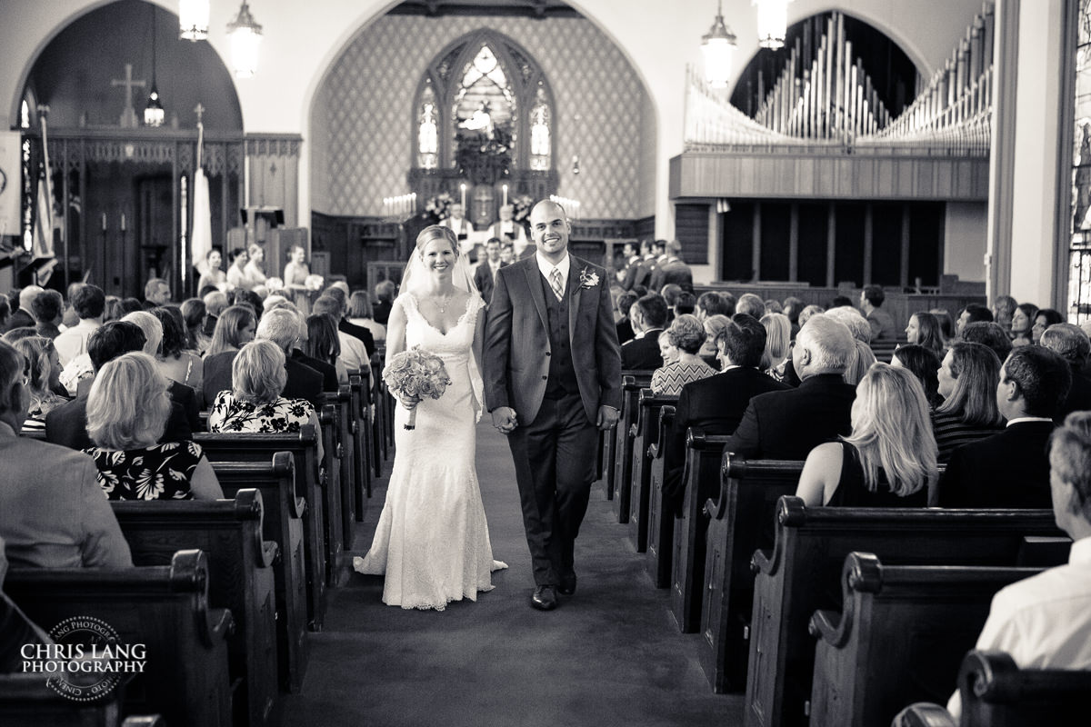 bride & groom walking down the isle  - Wedding ceremony photo - Wedding ceremonies - bride - groom - bridal party - wedding ceremony photography - ideas - Wilmington NC Wedding Photography