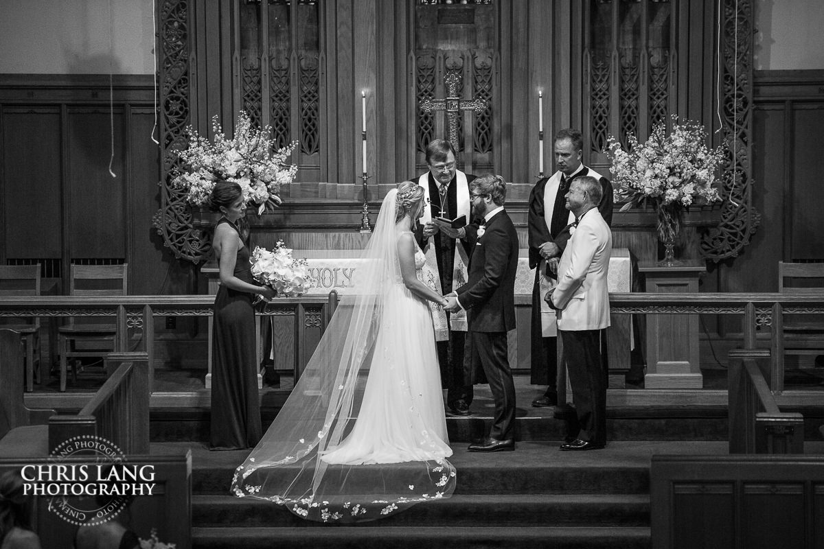 Bride & Groom at the Alter  - Wilmington NC Wedding Photography - Wedding ceremony photo - Wedding ceremonies - bride - groom - bridal party - wedding ceremony photography - ideas