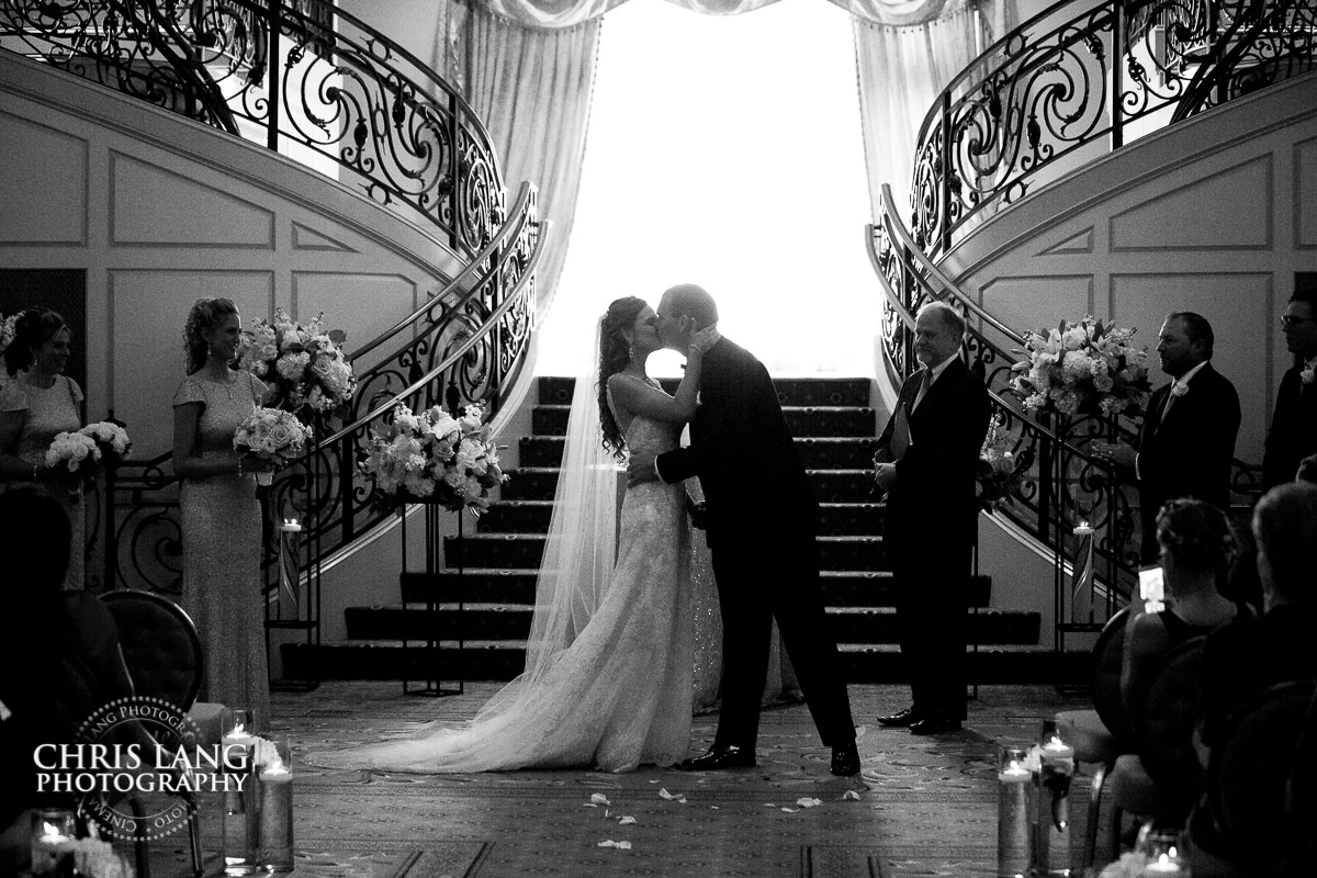 bride & groom first kiss - Wedding ceremony photo - Wedding ceremonies - bride - groom - bridal party - wedding ceremony photography - ideas - Wilmington NC Wedding Photography