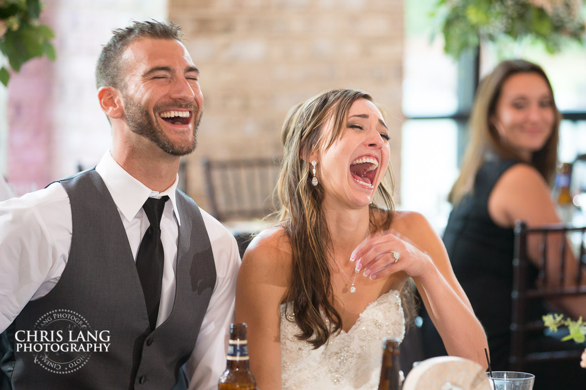 wedding toast - bride & groom laughing - wedding photo - wedding reception photo - Wedding Reception Ideas - Wilmington NC Wedding Photography