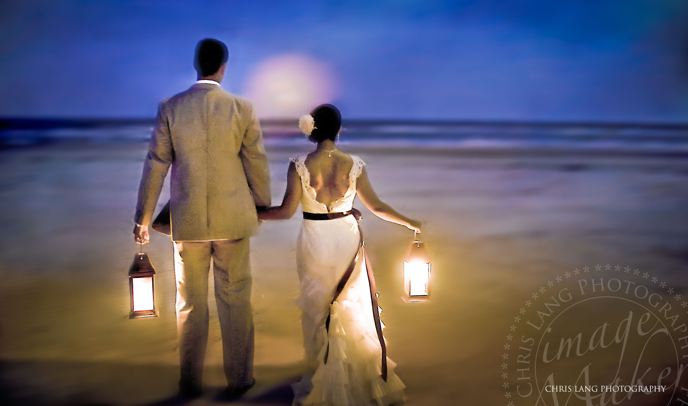 Creative wedding picture of bride and groom holding lanterns on the beach. Wilmington NC Photographer