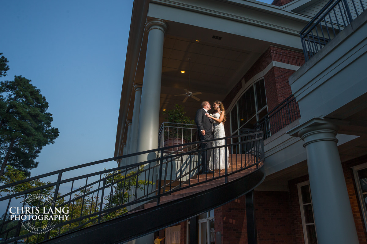 romantic wedding picture - sunset wedding photo - the golden hour - bride & groom - wedding dress - sunset wedding photography - twlight -wilmington nc wedding photographer