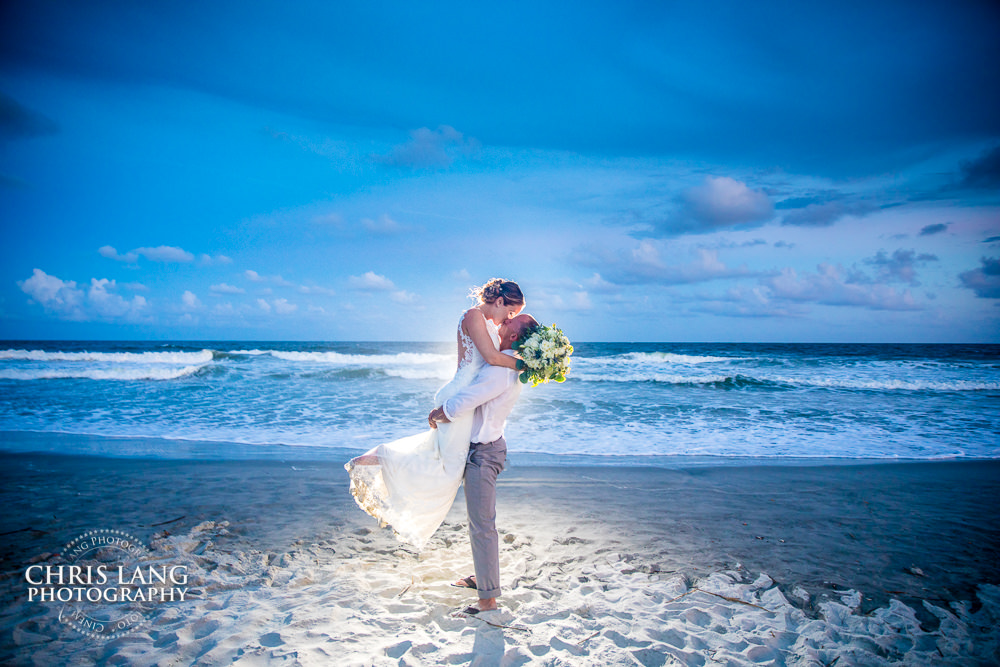 NC beach weddings - destination wedding - beach weddings - sunset wedding photo - the golden hour - bride & groom - wedding dress - sunset wedding photography - twlight on the beach