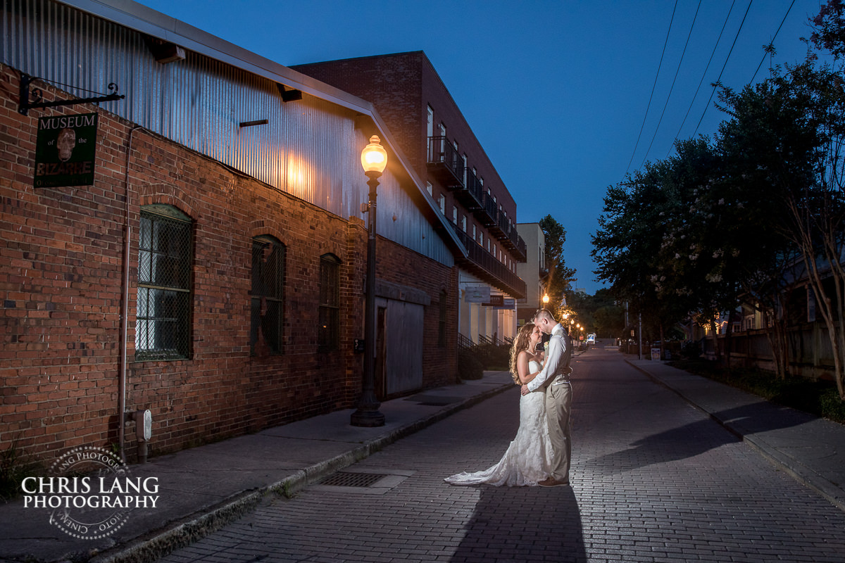 downtown wilmington nc - cobble stone street - sunset wedding photo - the golden hour - bride & groom - wedding dress - sunset wedding photography - twlight - wilmingtonnc wedding photographers