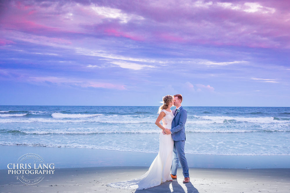 beach weddings - sunset wedding photo - the golden hour - bride & groom - wedding dress - sunset wedding photography - twlight on the beach - destination weddings- wrightsville beach nc weddings