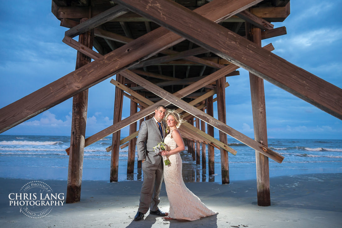 Ocean Isle Beach - beach weddings - sunset wedding photo - the golden hour - bride & groom - wedding dress - sunset wedding photography - twlight on the beach - destination weddings