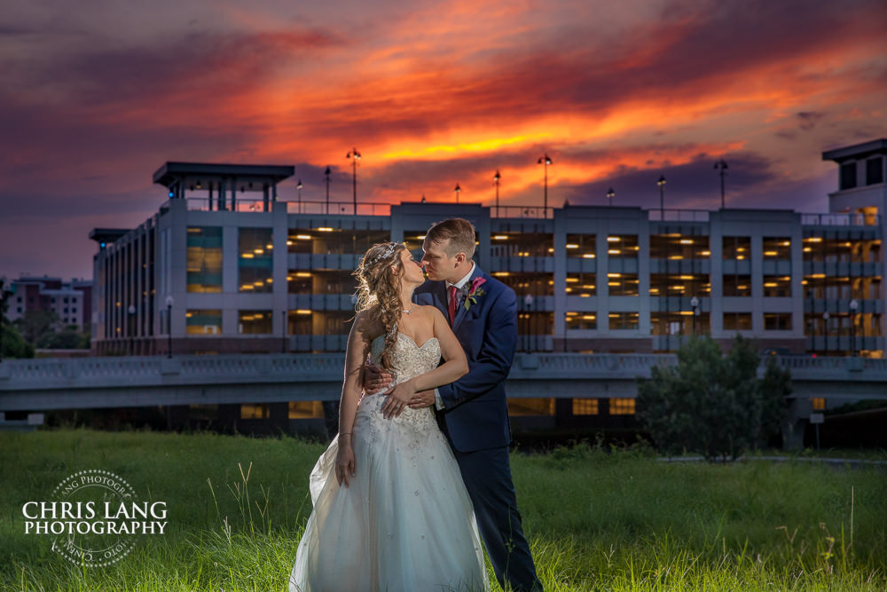 brooklyn arts center wilmington nc - sunset wedding photo - the golden hour - bride & groom - wedding dress - sunset wedding photography - twlight 
