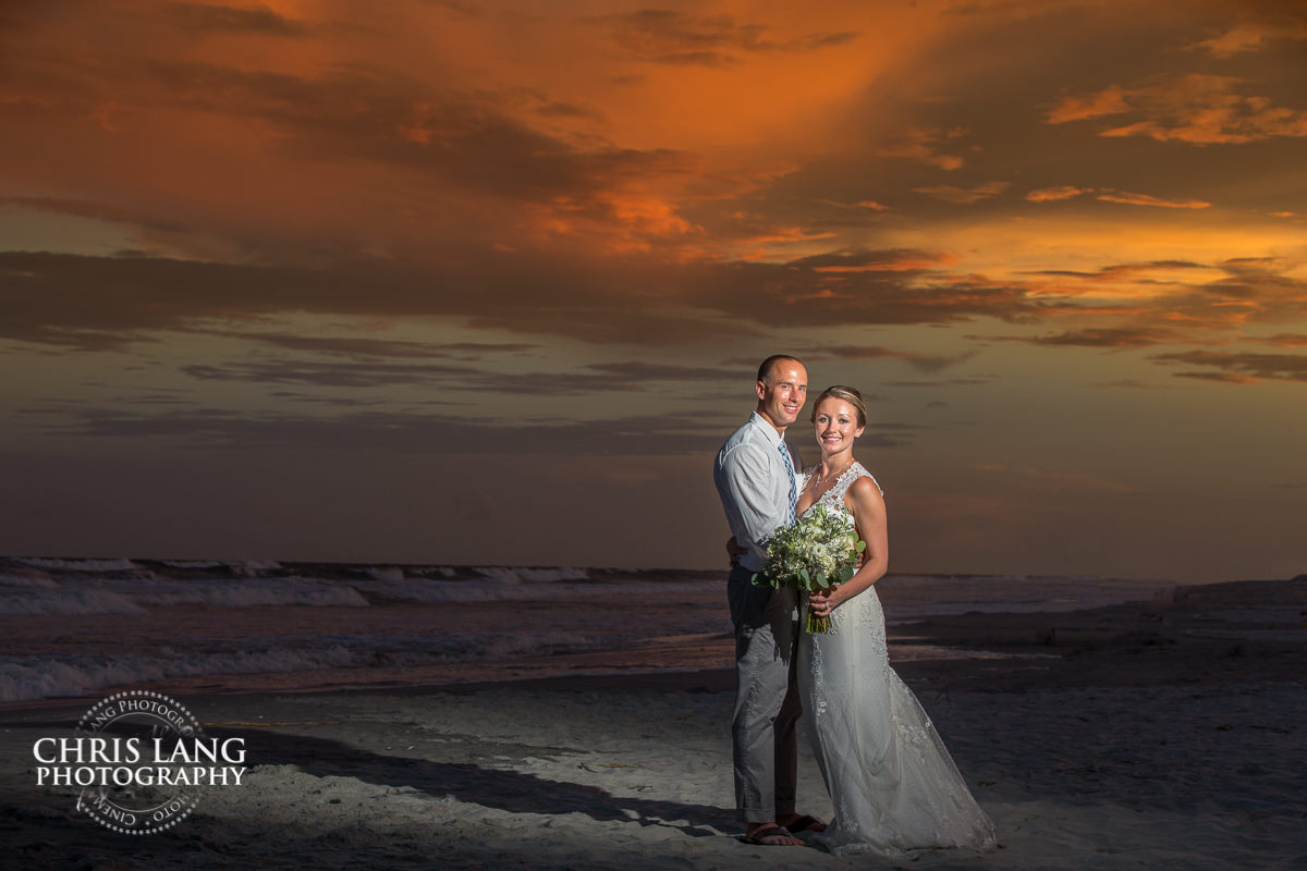 topsail island nc weddings - beach weddings - sunset wedding photo - the golden hour - bride & groom - wedding dress - sunset wedding photography - twlight on the beach