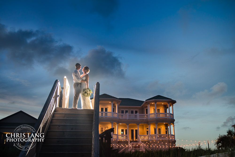 Topsail Island - Beach House Wedding - beach weddings - sunset wedding photo - the golden hour - bride & groom - wedding dress - sunset wedding photography - twlight on the beach