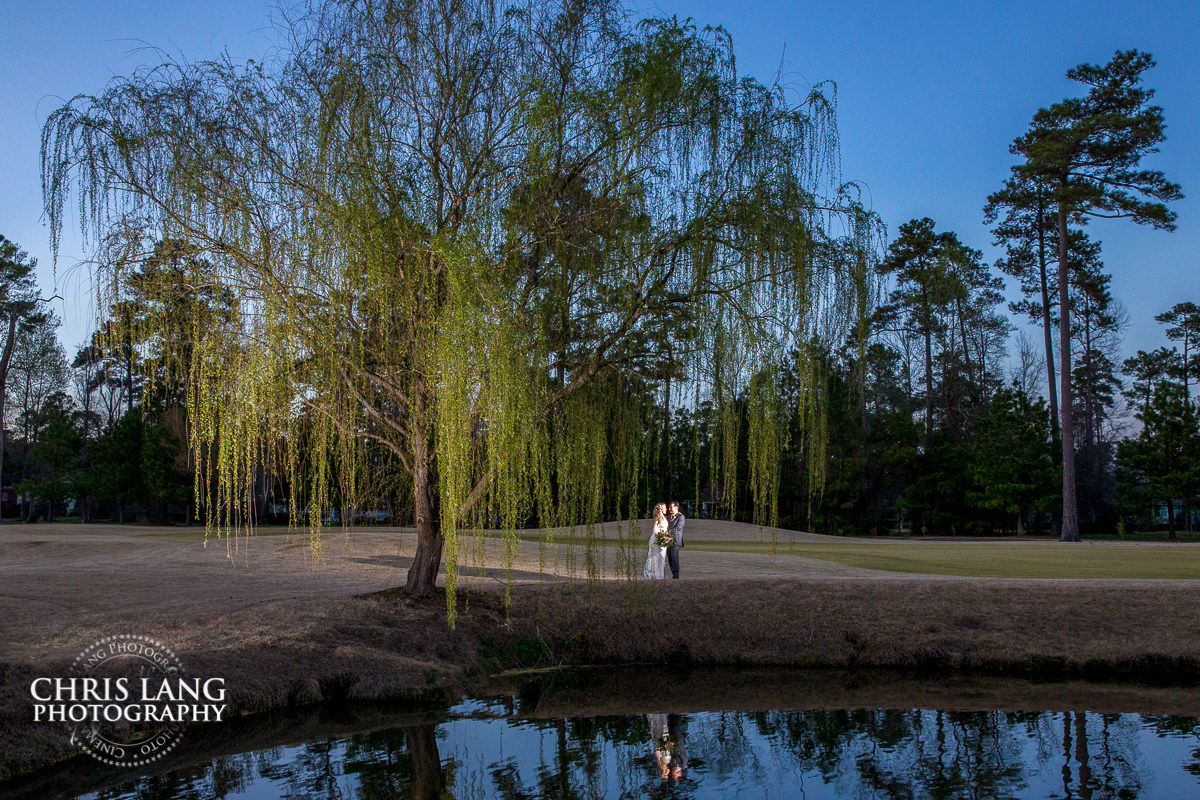 amazing sunset wedding photo - the golden hour - bride & groom - wedding dress - sunset wedding photography - twlight  - wilmington nc wedding photographers