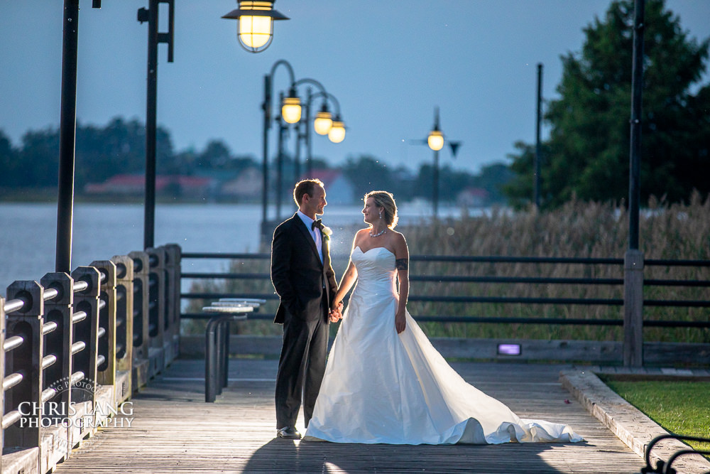 wedding at embassy suites by hilton - wilmington nc - wedding photo of bride & groom on the cape fear river deck - wedding and event venues - 