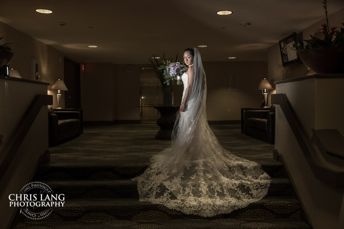 bride inside the lobby of Hotel Ballast - Wilmington NC - Wedding & Reception Venue - Wedding Photography - Bride - Groom - Chris Lang Photography 