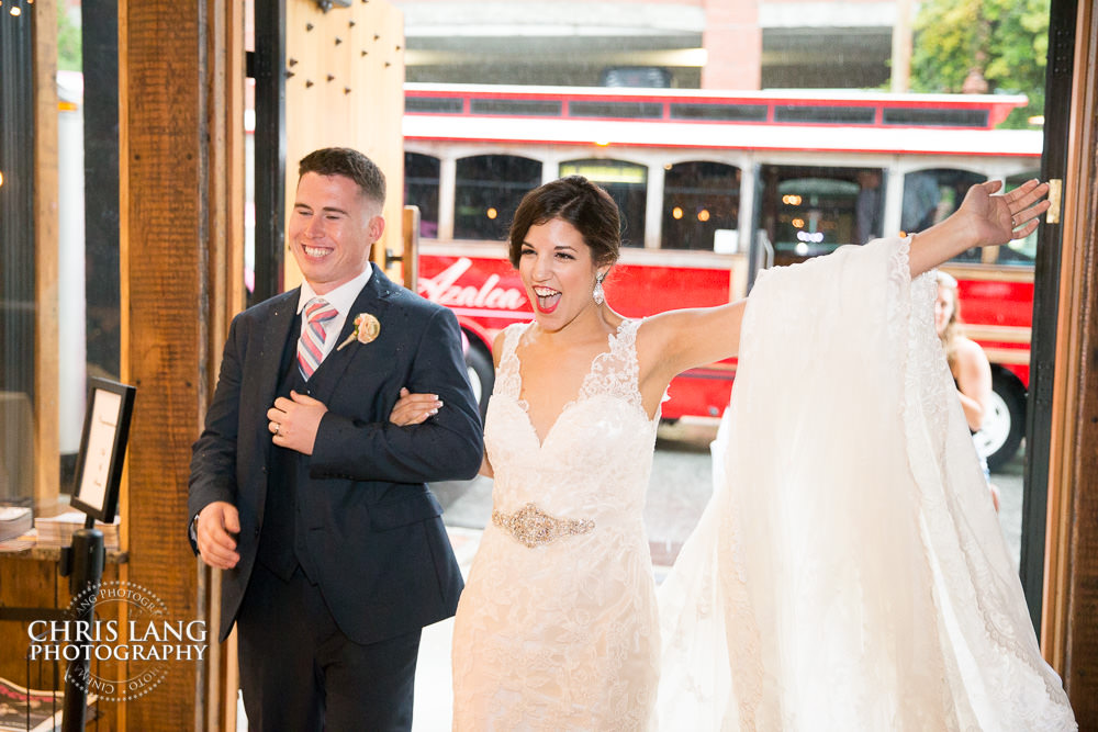 bride & groom entrance at ironclad brewery - wedding photo - wedding photography - wedding & reception ideas - 