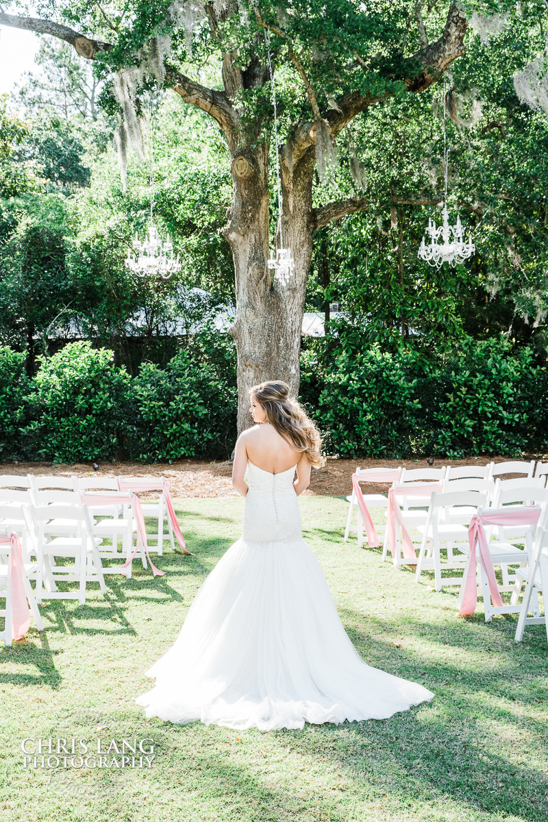 image of bride in her wedding dress at Wrightsville Manor in Wilmington NC - place to get married - Wedding Photography - Wilmington NC Wedding Photographers